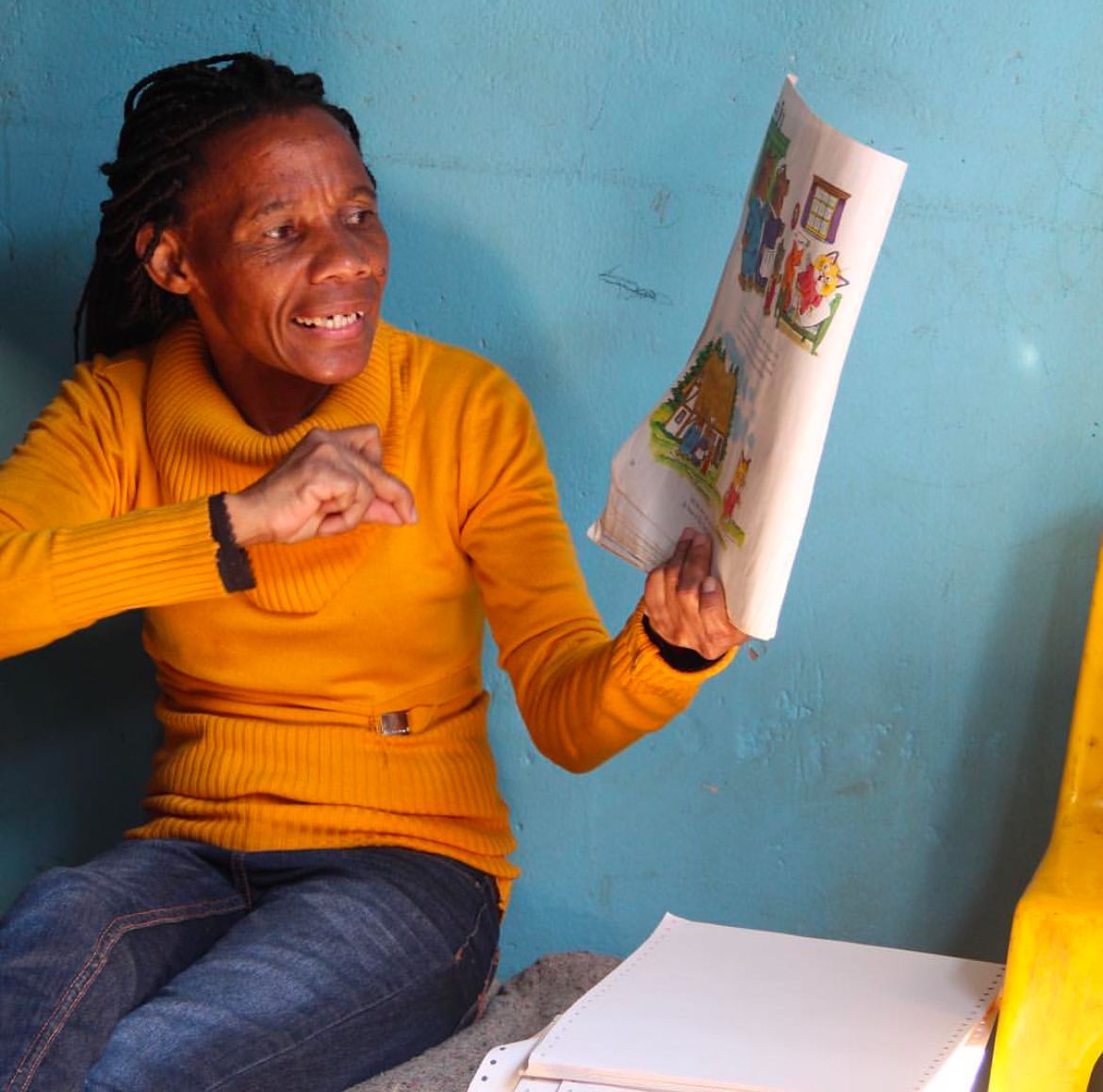 Volunteer teaching children